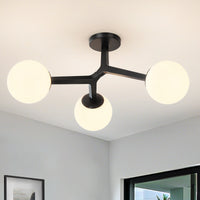 Black frosted glass globe semi-flush ceiling light installed on ceiling