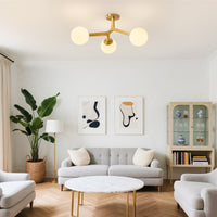 Gold 3-light globe semi-flush ceiling light in modern living room