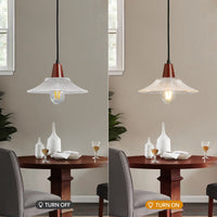 Side-by-side views of clear ribbed glass pendant light above a dining table in different lighting states