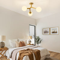 Gold 3-light semi-flush ceiling light in modern bedroom