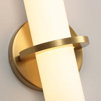 Gold wall sconce mounting bracket and frosted acrylic shade detail