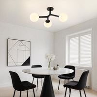 Black frosted glass globe semi-flush ceiling light in modern dining room