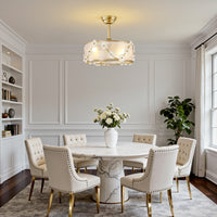 Floral caged ceiling fan with light installed above a dining room table