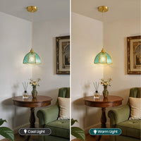 Blue glass pendant light shown under cool and warm bulb lighting for visual comparison