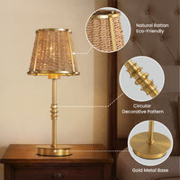 Gold rattan table lamp detail showing woven shade, decorative stem, and metal base