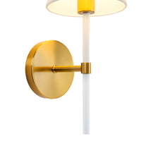 White linen shade and matte gold wall sconce detail